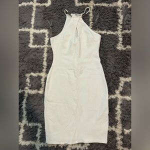 White mini dress. Keyhole opening